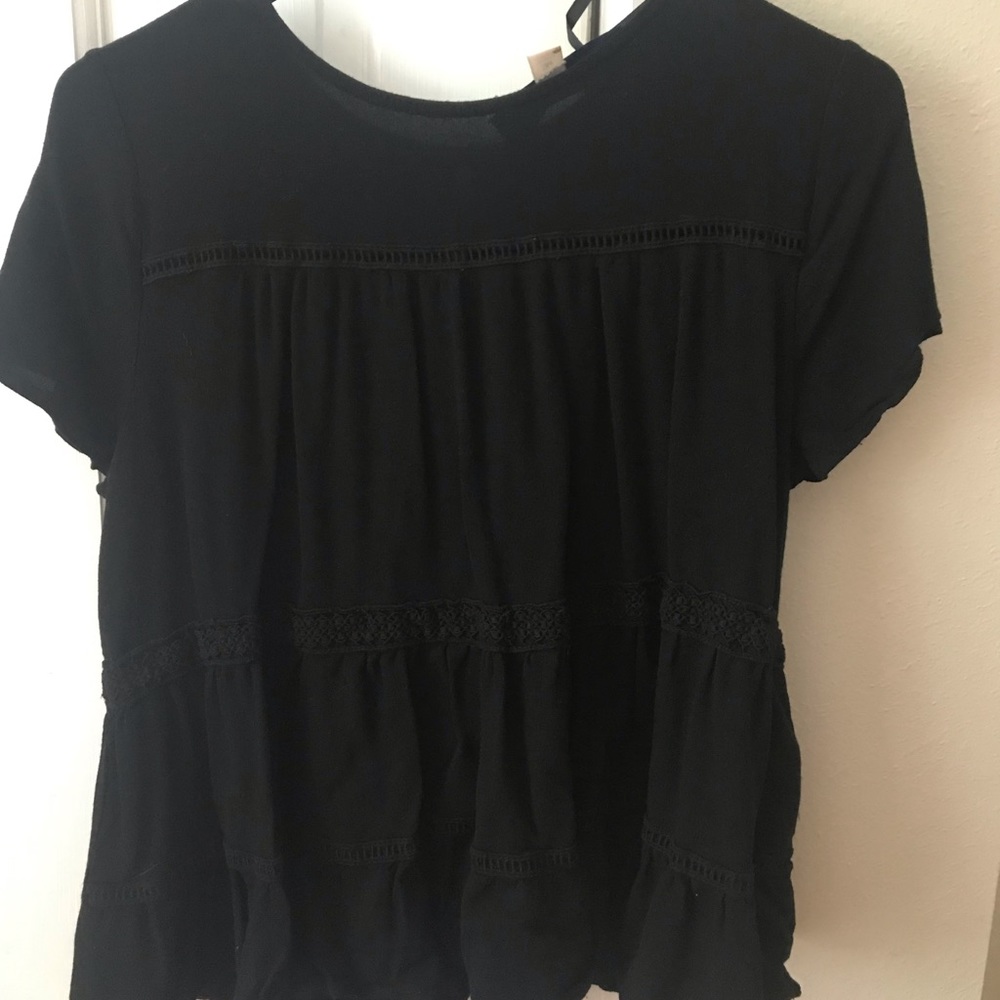 Flouncy and cute black blouse.